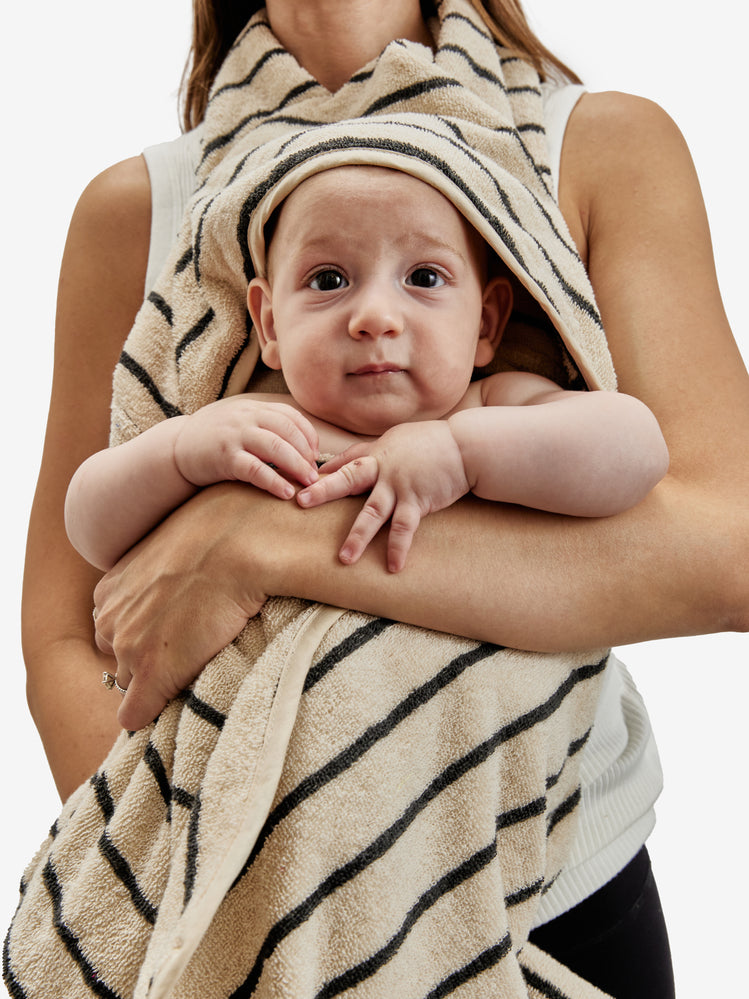 cream.black cuddle baby towel