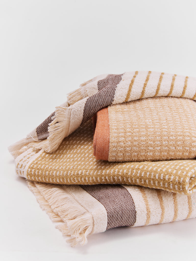 stone olive Dotty towels